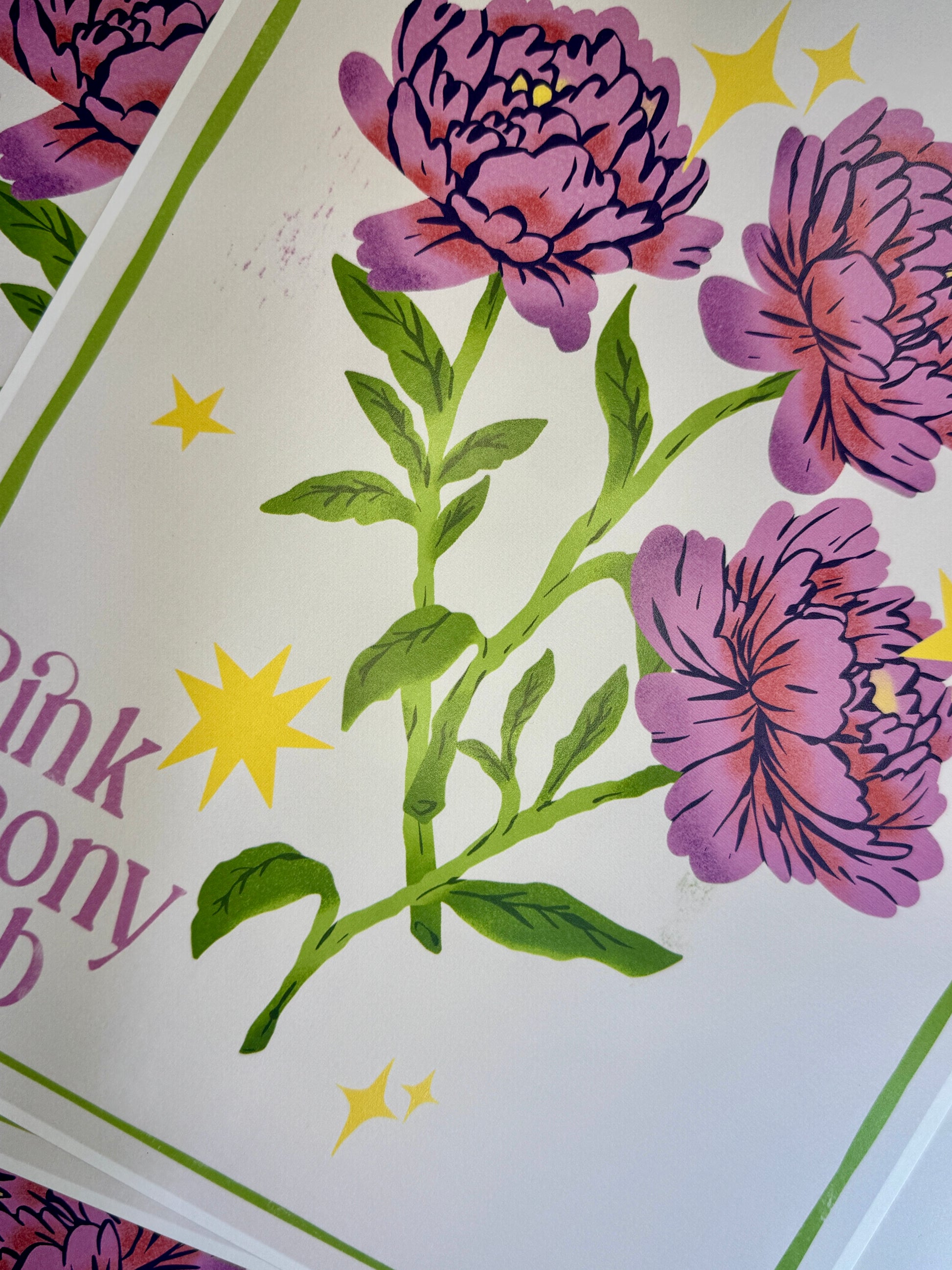 Poster of Floral design with purple flowers and green leaves on a white background