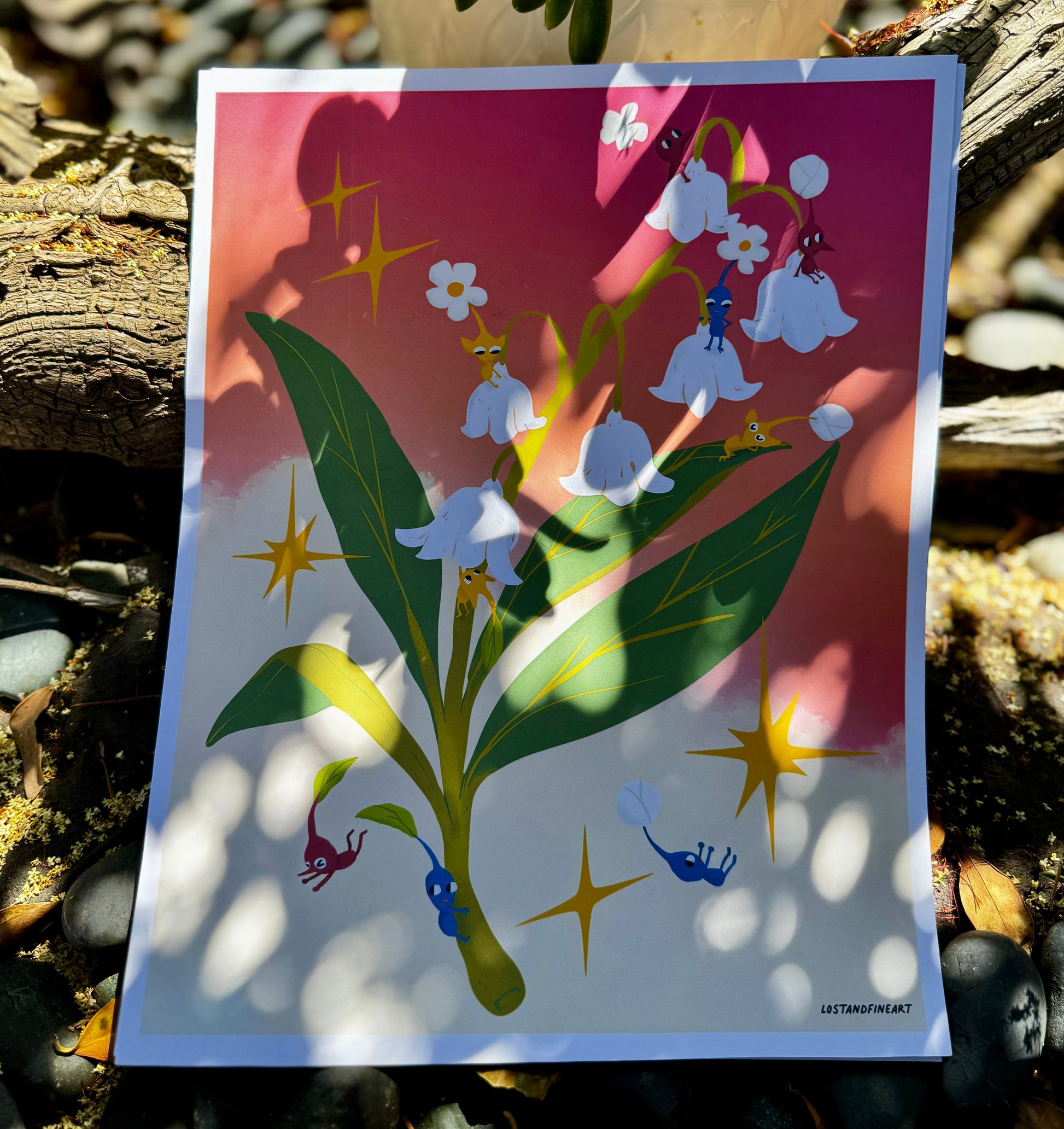 Card with floral design featuring leaves and flowers on a natural background